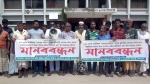 ফুলবাড়ীতে মসজিদের জমি দখলচেষ্টার প্রতিবাদে মানববন্ধন