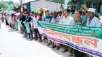 ফুলবাড়ীতে শতবর্ষী কবরস্থান রক্ষার দাবিতে মানববন্ধন