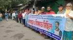 আগৈলঝাড়ায় মিথ্যা মামলার প্রতিবাদে মানববন্ধন