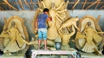 দুমকীতে প্রতিমা তৈরিতে ব্যস্ত মৃৎশিল্পীরা