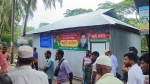 কলাপাড়ায় খাস জমিতে বিএনপির সাইনবোর্ড টাঙিয়ে ঘর নির্মাণ