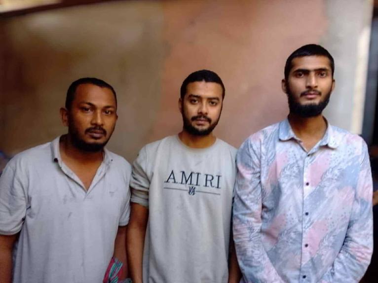 লিবিয়ার কারাগার থেকে সদ্যমুক্তি পাওয়া তিন যুবক।