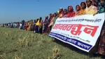 গলাচিপার চরবাংলায় কৃষি খাস জমি দখলের প্রতিবাদে মানববন্ধন