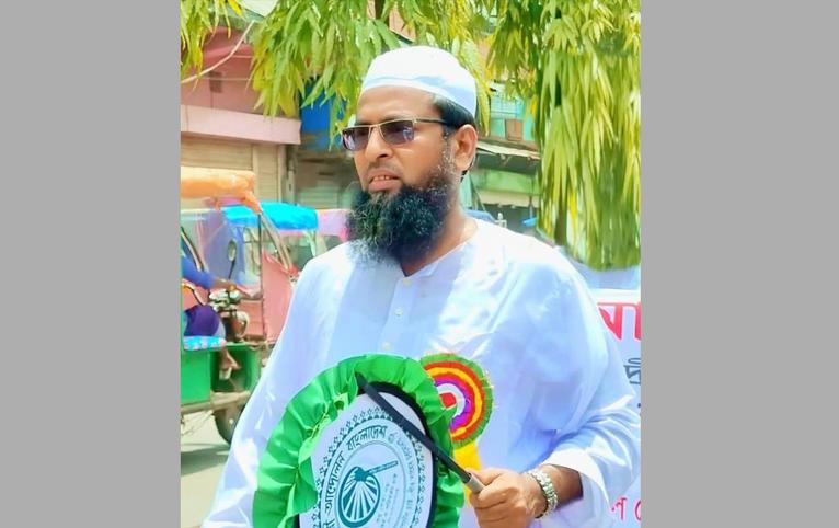 হাতপাখা প্রতীকের প্রার্থী মাওলানা মাহমুদুল হোসাইন অলিউল্লাহ। ছবি- সংগৃহীত
