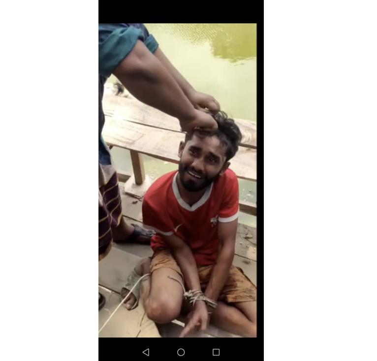 বাউফলে চুরির অভিযোগে যুবককে হাত বেঁধে চুল কেটে শাস্তি, ভিডিও ভাইরাল