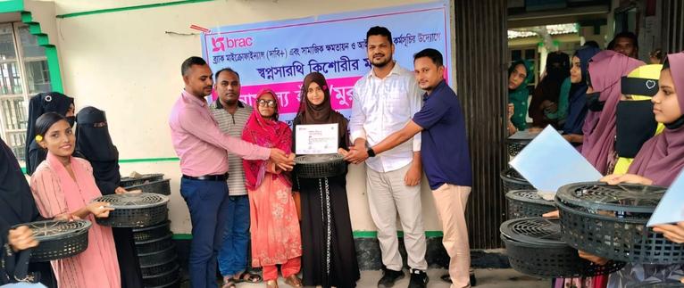 কলাপাড়ায় ৩৪ কিশোরীর মাঝে হাস-মুরগি বিতরণ
