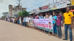 ট্রাক চালক হানিফ হত্যা: আসামি গ্রেফতার ও বিচার দাবিতে কুয়াকাটায় শ্রমিকদের মানববন্ধন